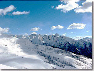 Dal Montebello panoramica verso Carisole e il Becco in una fredda e ventosa giornata di febbraio