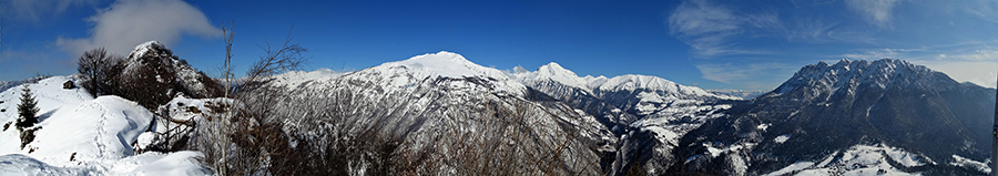Dalla croce del Monte Castello (1425 m) vista panoramica versole cime del M.A.G.A. (Menna, Arera, Grem, Alben)