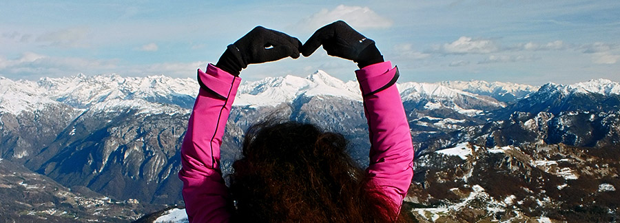 Zoom con un cuore di braccia verso L'Arera e il Menna 