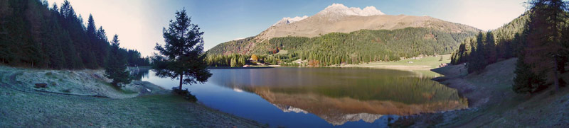 Il Pizzo Camino si specchia nel Lago di Lova